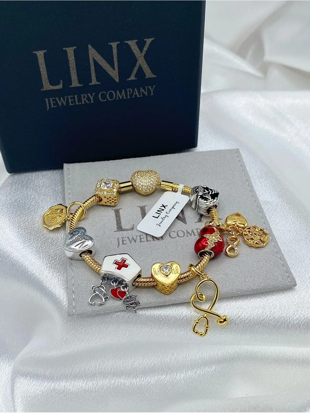 Linx Gold Snake Chain Charm Bracelet with Registered Nurse, Mom & Family Charms
